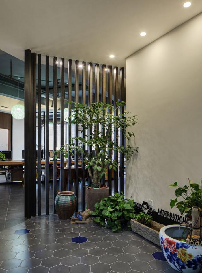 進出口貿(mào)易公司辦公室進門區(qū)裝修設計效果圖