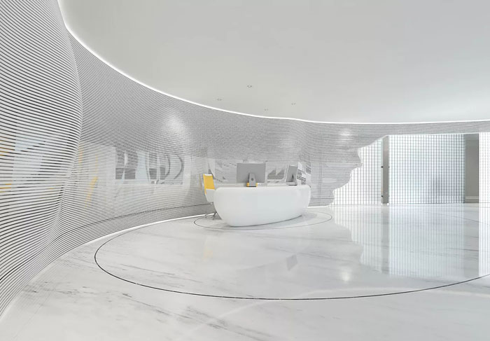 集團辦公室前臺裝修設(shè)計效果圖