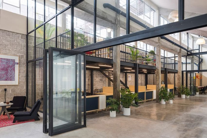 工廠辦公室洽談區(qū)改造裝修設計效果圖